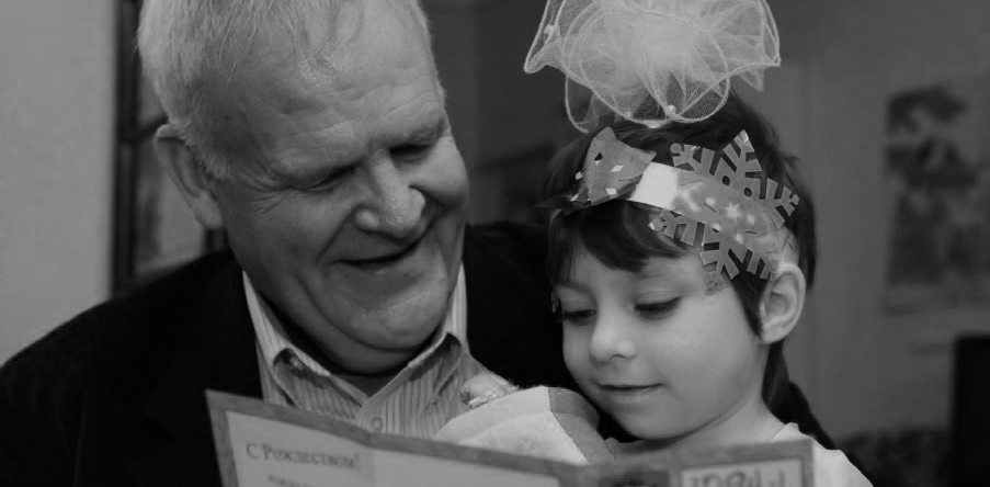 Misionary Reading With Child